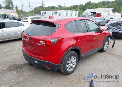 2015 Mazda Cx-5 Touring z USA, uszkodzony, nr VIN JM3KE4CY0F0509864